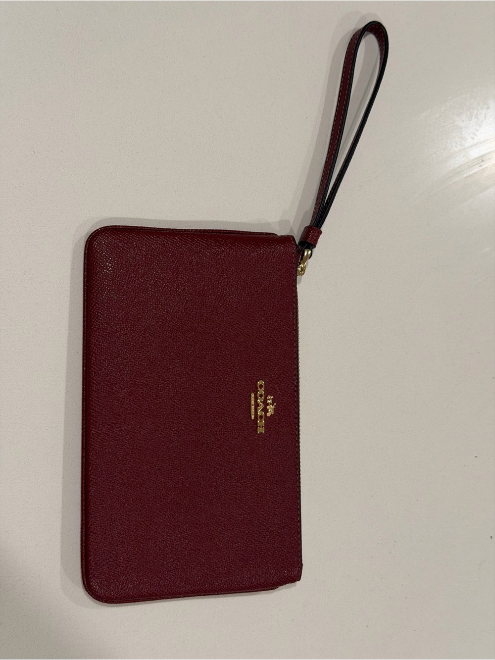 Coach Leather Wristlet in Deep Wine with Gold Hardware